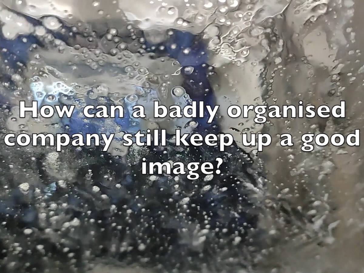 Wash Wash: Video Wash Wash: a car moves through a carwash as questions posed by the
                        artist's peers appear on screen.